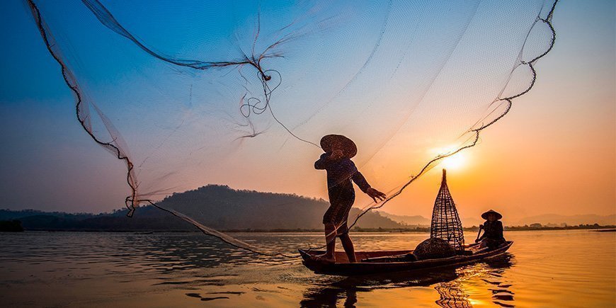 Kalastaja Mekongissa Vietnamissa